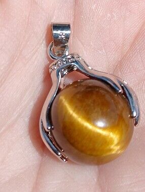 New 18K Hands Holding Tiger Eye Sphere Pendant.